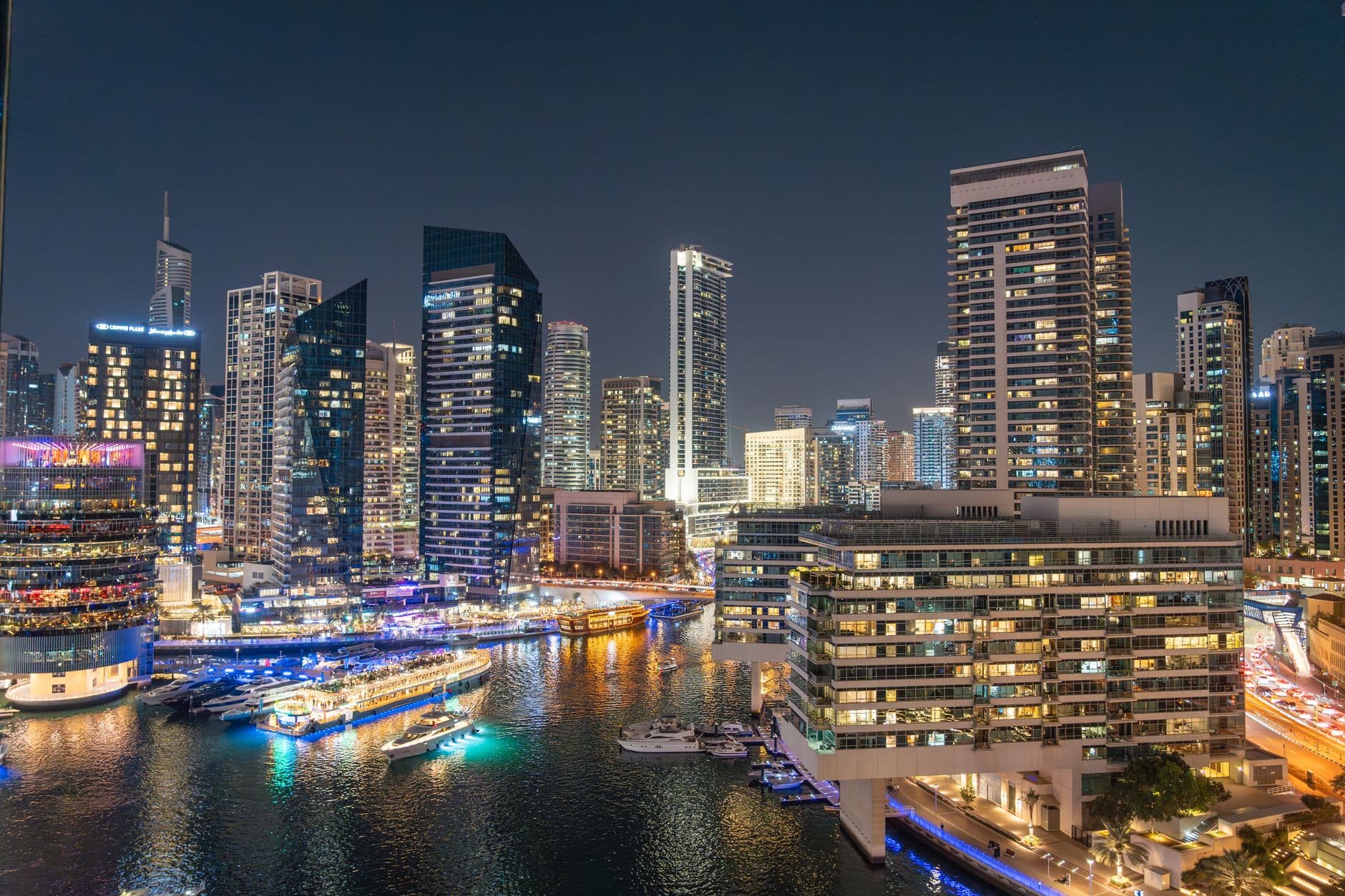 Invest Dubai real estate 2026 Downtown skyline Burj Khalifa modern residential towers