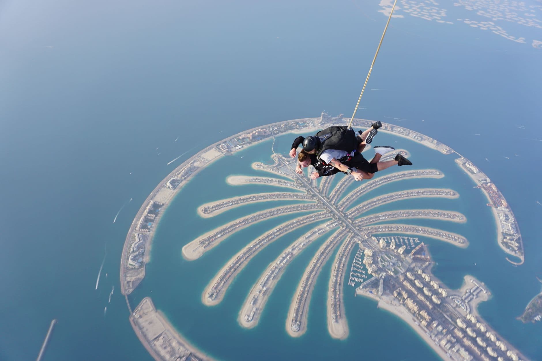 Tandem skydive jump above Palm Jumeirah Dubai with Atlantis and Burj Al Arab view skydive price 2026